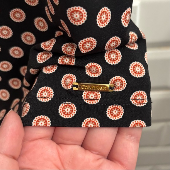 Calvin Klein Women’s Sleeveless Rosette Blouse with Pleated Neckline - Picture 6 of 6